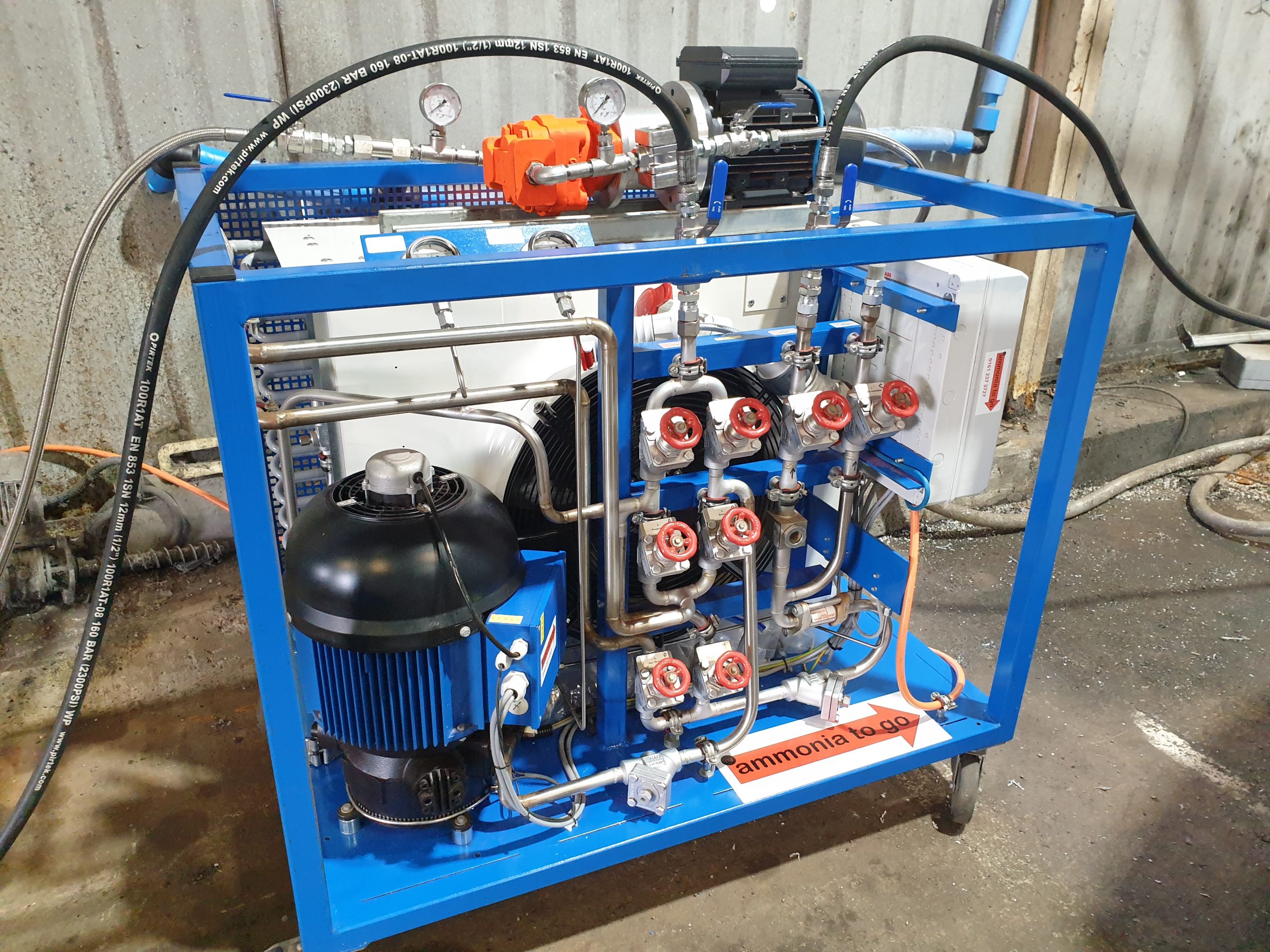 Ammonia refrigerant recovery unit with compressor and transfer pump